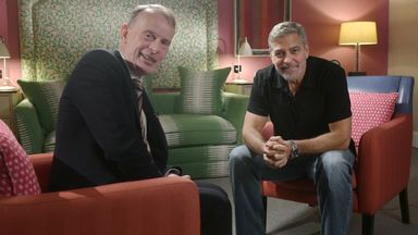 For use in UK, Ireland or Benelux countries only BBC handout photo of George Clooney (right) appearing on the BBC1 current affairs programme, The Andrew Marr Show, in a pre-recorded interview.